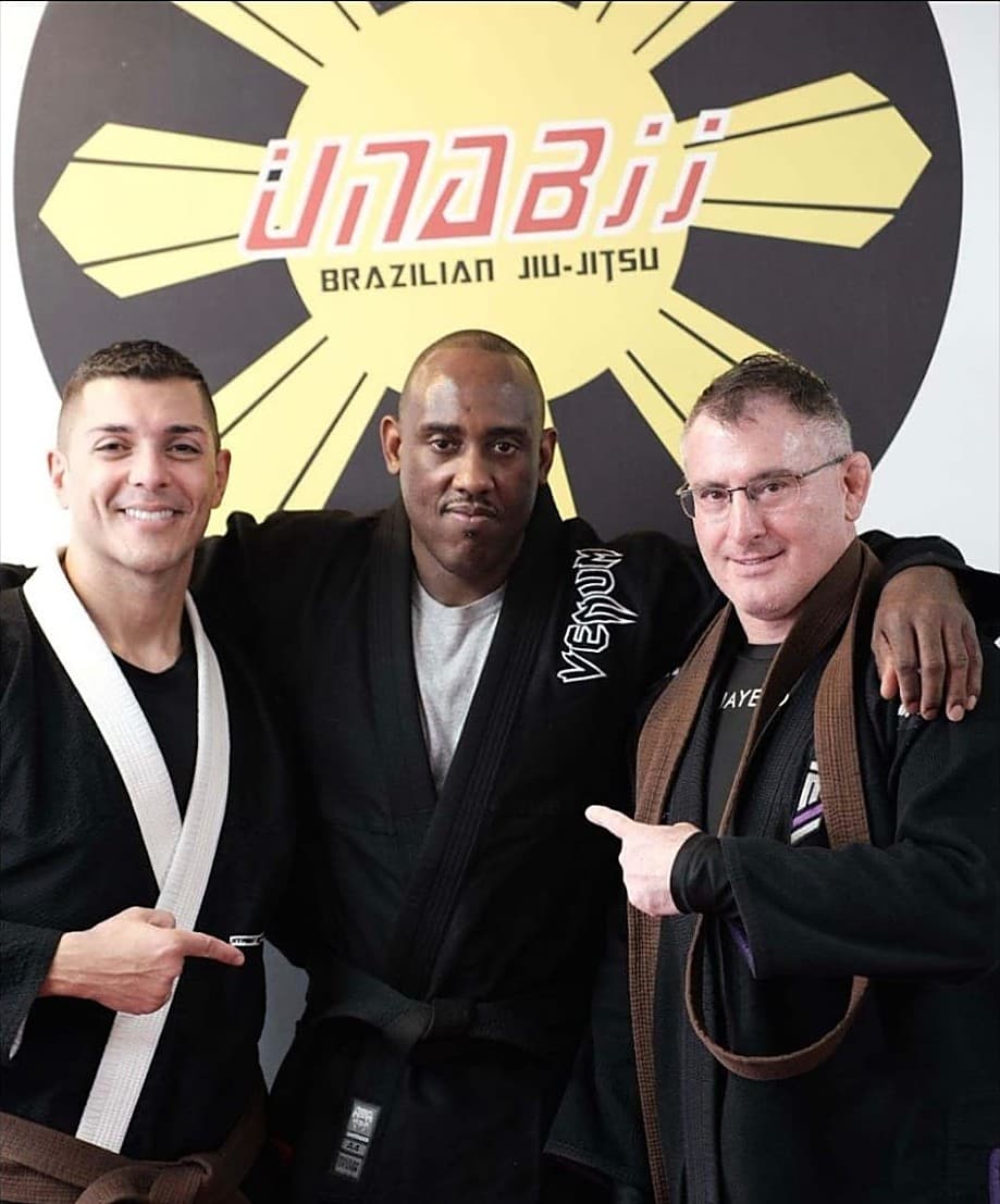 Coach Len with students after earning his black belt